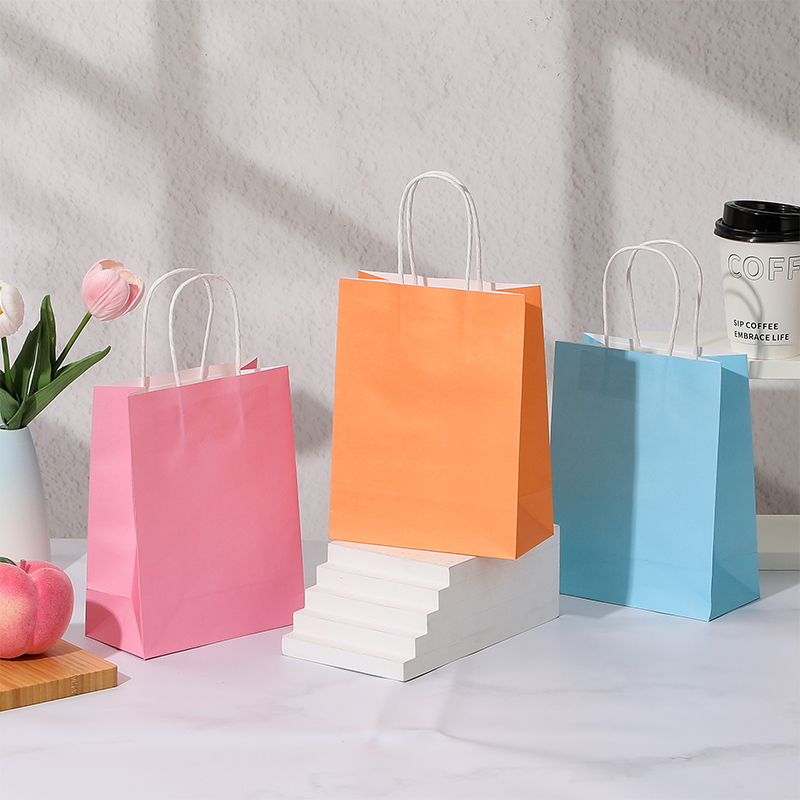 Sacs à provisions en papier kraft couleur bonbon avec poignées en papier torsadées