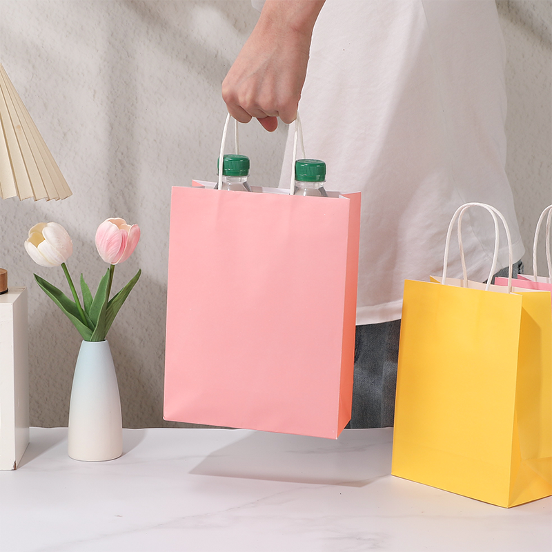 Sacs à provisions en papier kraft couleur bonbon avec poignées en papier torsadées
